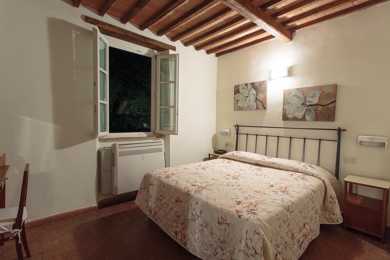 מגדל אגם פוצ'יני Hotel Giuly מראה חיצוני תמונה